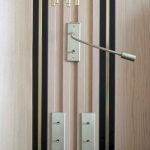 Liseuse Nito en finition Champagne Satiné.